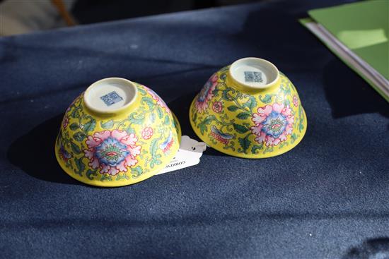 A pair of Chinese yellow ground famille rose bowls, Daoguang six character seal mark and probably of the period (1821-50), Diam.11.5cm